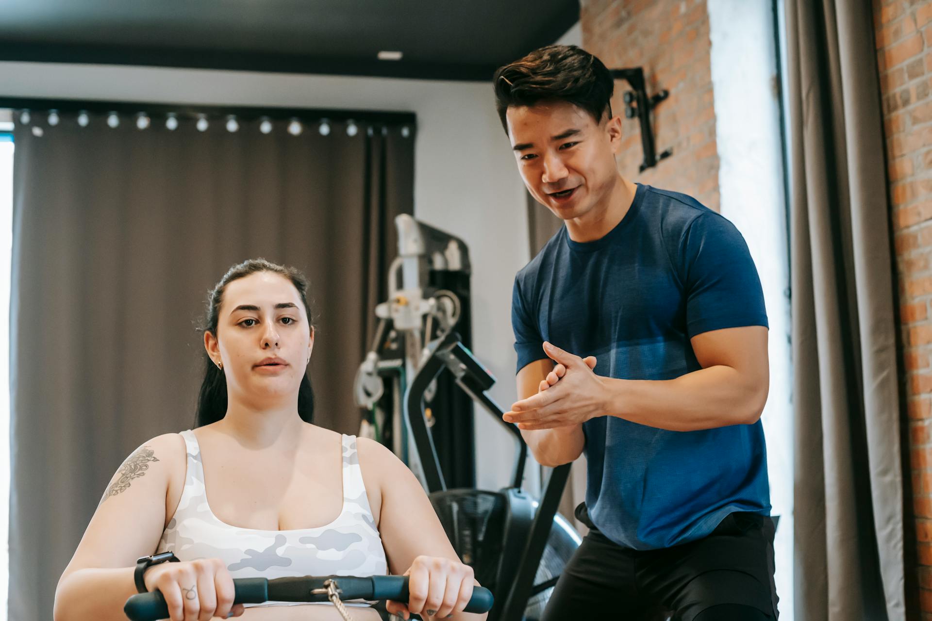 Rower and coach training on an erg